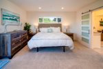 The Master bedroom features a cal king bed with en suite bathroom.